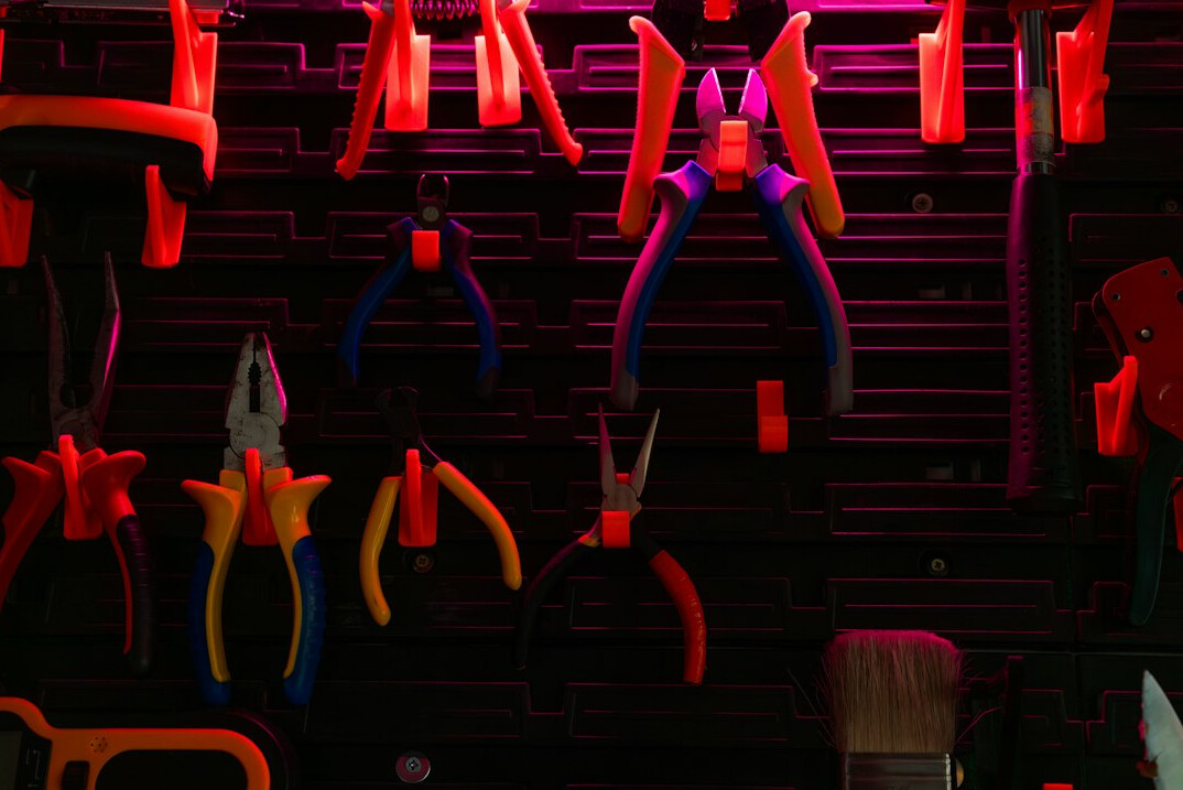 Workshop wall with neatly hung hand tools