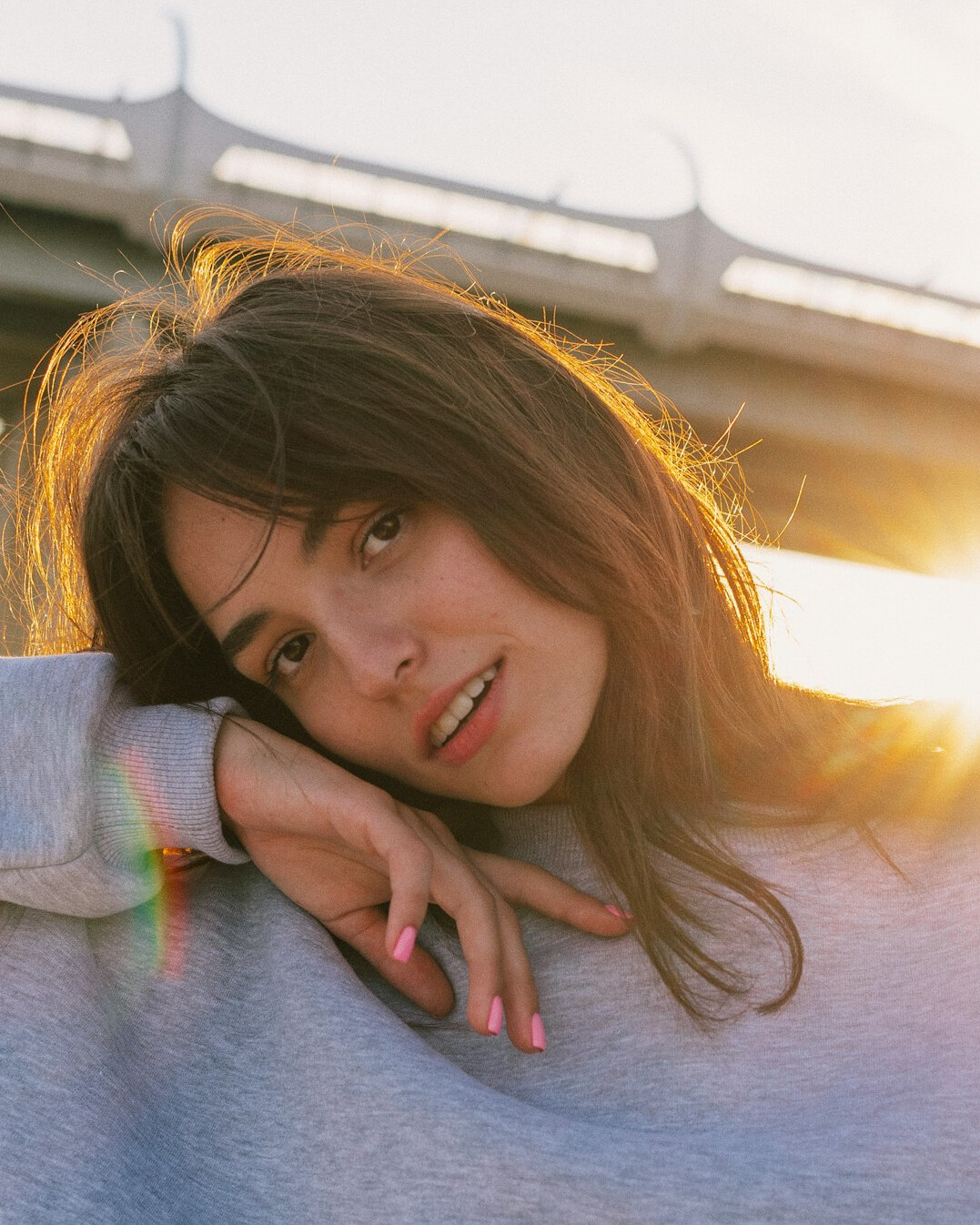 Portrait of a smiling young woman with dark hair